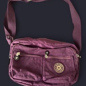 Kipling purple crossbody purse bag